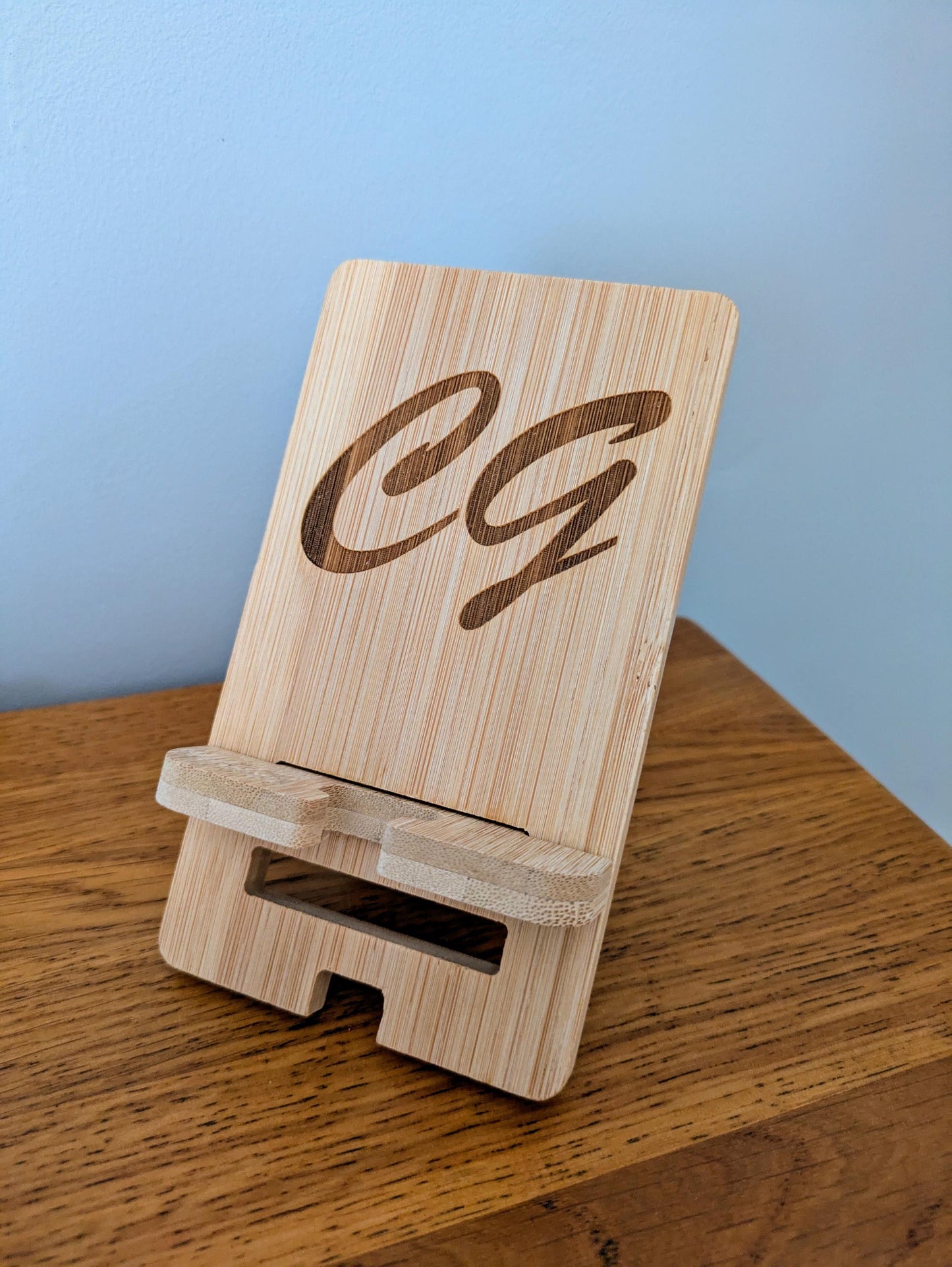 Stylish bamboo phone stand